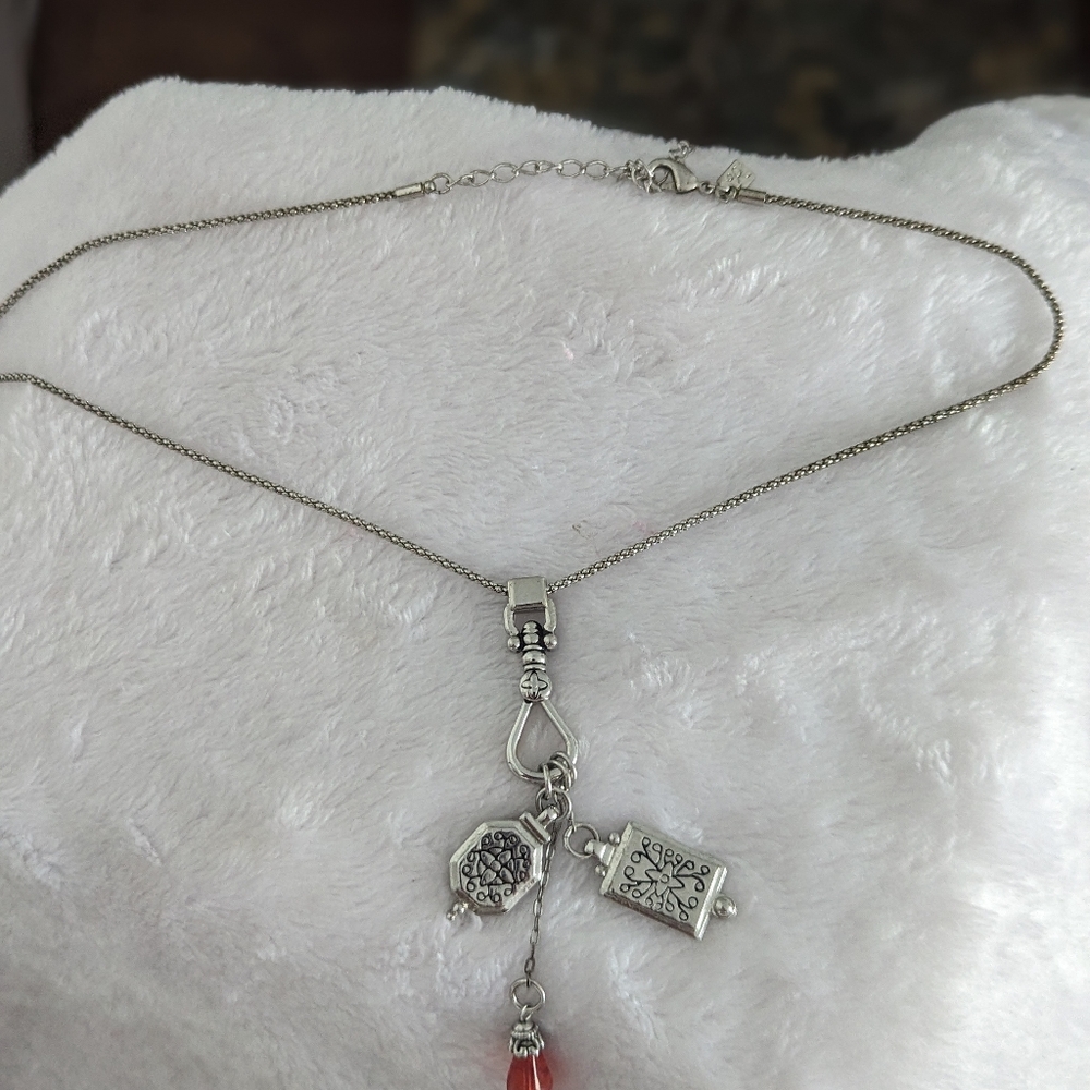 L. R. Necklace with 3 hanging charms.